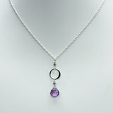 Ring Necklace by Susan Roberts